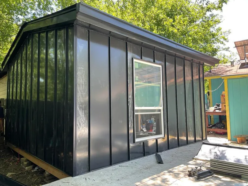 Black standing seam metal wall panels for Roof Inspection in Weare