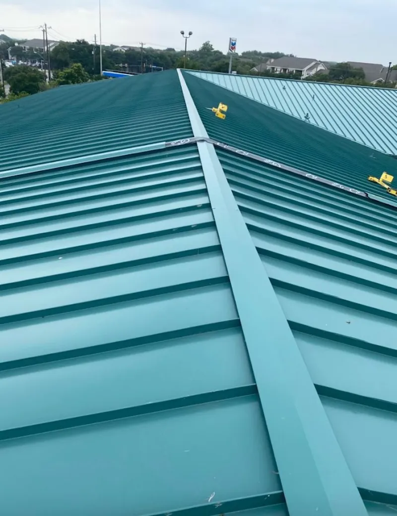 Green commercial metal roof ridge and valley for Metal Roof Repair in Weare